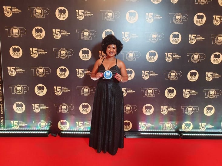 Laís Ramos, coordenadora de gestão do Rede Parcerias, representado o RP no 100 Open 2023